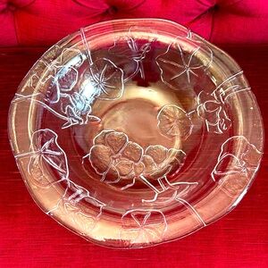 Large clear glass bowl with a minimal pattern of leaves.